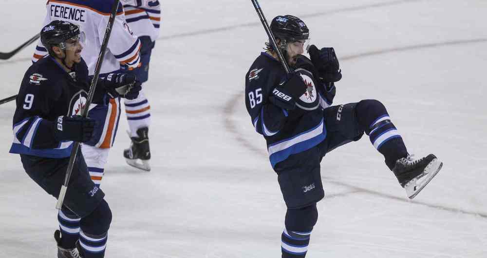 MIKE DEAL / WINNIPEG FREE PRESS
Winnipeg Jets' Mathieu Perreault (85) celebrates his game-winning goal in overtime (3-2) against the Edmonton Oilers during NHL action in Winnipeg Wednesday at the MTS Centre.