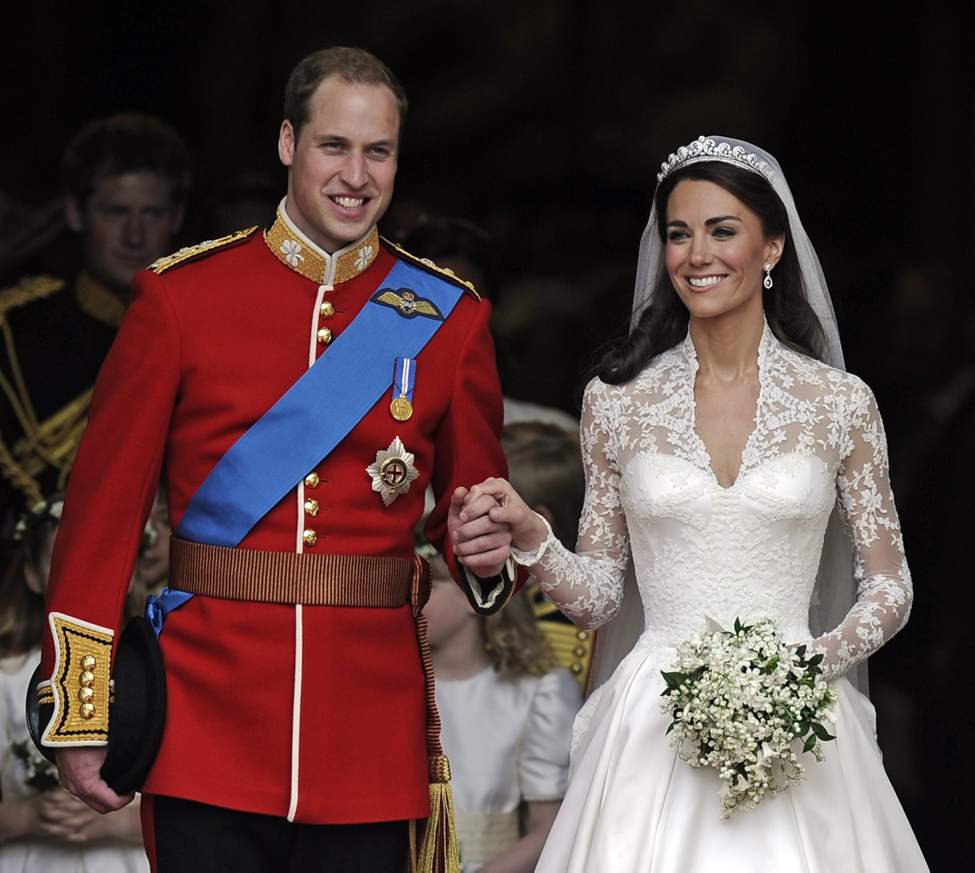 CP
Britain's Prince William and his wife Kate, Duchess of Cambridge stand outside of Westminster Abbey after their Royal Wedding in London Friday, April, 29, 2011. (AP Photo/Martin Meissner)