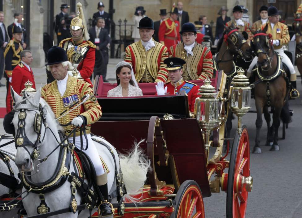 CP
Britain's Prince William, right, and his wife Kate, Duchess of Cambridge, leave Westminster Abbey at the Royal Wedding in London Friday, April, 29, 2011. (AP Photo/Alastair Grant)