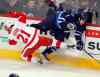 BORIS MINKEVICH / WINNIPEG FREE PRESS
The Jets' Adam Pardy gets past Detroit Red Wings Tomas Tatar during Thursday's game at the MTS Centre.