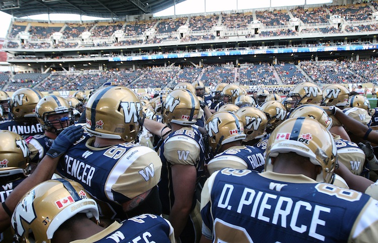 JOE BRYKSA / WINNIPEG FREE PRESS
The Bombers get fired up before opening kickoff.