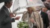 Prince Charles and Camilla arrive in windy and wet Winnipeg
