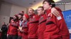 Canadian Olympic speedskaters celebrate their numerous medals
