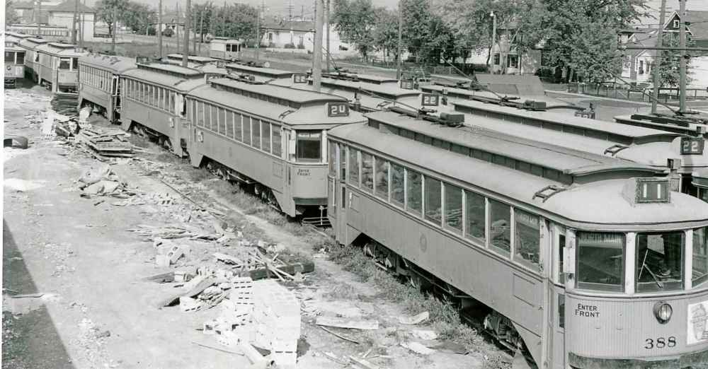 WINNIPEG FREE PRESS FILES
Image published Sept. 17, 1955. Published caption: The bells on the streetcars will ring out the old and ring in the new this weekend. They'll be riding the rails for the last time at a special ceremony on Monday. The tired old trams will fold up their trolleys early Sunday morning and noisily steal away to the darkened north Winnipeg car yard.