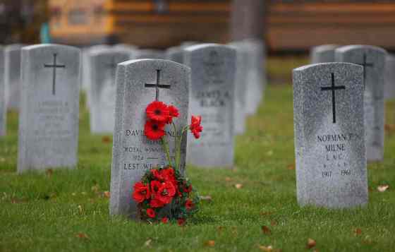 Bruce Bumstead/Brandon Sun FilesApproximately 700 students from École Harrison, St. Augustine and Valleyview School participated in this year's No Stone Left Alone ceremony at the Brandon Cemetery on Thursday morning. Escorted by members of the 2nd Battalion Princess Patricia's Canadian Light Infantry, the students placed poppies on each of the veteran's gravestones following the act of remembrance ceremony at the cenotaph.