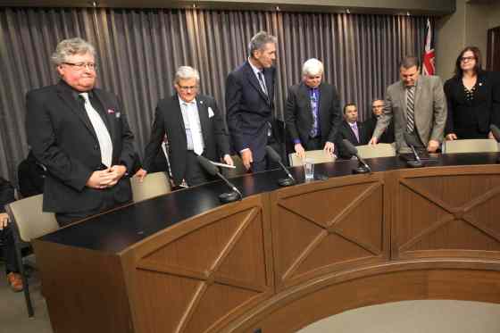 JOE BRYKSA / WINNIPEG FREE PRESSRepresentatives from Manitoba's aerospace industry and advanced manufacturing sectors with Premier Brian Pallister speak on the construction of the Factory of the Future last November.