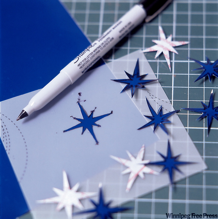 Cut out designs on self-stick paper.