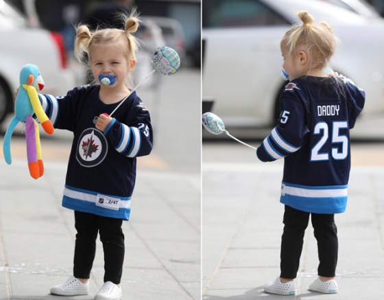 Two-and-a half-year-old Riley Stastny, daughter of Winnipeg Jets centre Paul Stastny, wears her favourite Jets jersey while out shopping with her mom, dad and little baby brother Friday. (Ruth Bonneville / Winnipeg Free Press)