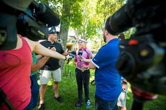 Jason Bell (left) participates in a media scrum with Brooke Henderson at the St. Charles Country Club. (Mikaela MacKenzie / Winnipeg Free Press files)