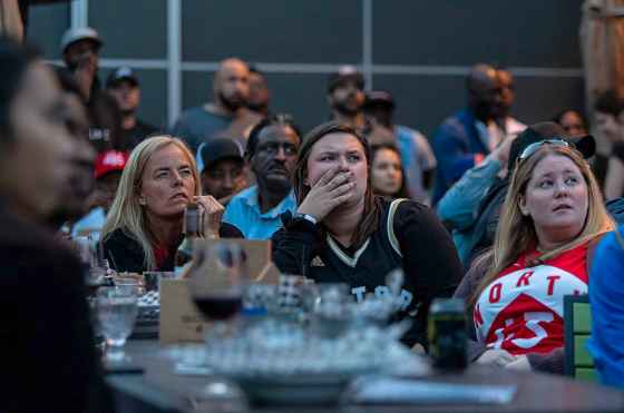 SASHA SEFTER / WINNIPEG FREE PRESSWinnipeg Raptors fans watch the game on the rooftop patio of the Metropolitan Entertainment Centre.