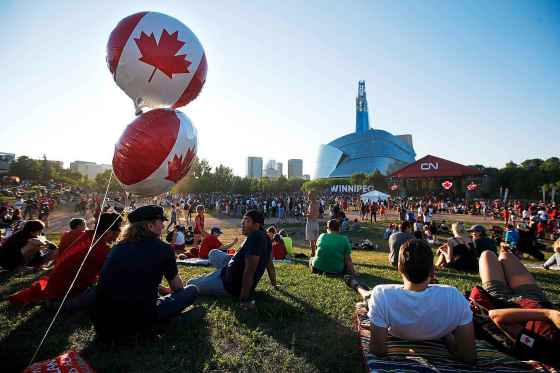 JOHN WOODS / WINNIPEG FREE PRESS Thousands of people attended Canada Day celebrations at The Forks.