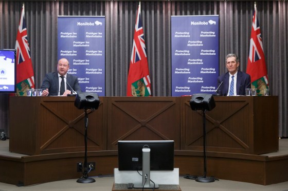 Chief provincial public health officer Dr. Brent Roussin (left) and Premier Brian Pallister (Mike Deal / Winnipeg Free Press files)