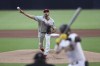 Philadelphia Phillies starting pitcher Zach Eflin throws to San Diego Padres' Jurickson Profar during the first inning of a baseball game Saturday, June 25, 2022, in San Diego. (AP Photo/Derrick Tuskan)