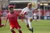 Canada Women’s Adriana Leon (left) battles for the ball with Korean Republic Women’s Hyeri Kim during first half international friendly action in Toronto, Ont., Sunday June 26, 2022. THE CANADIAN PRESS/Chris Young