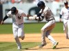 New York Yankees second baseman Gleyber Torres, left, tags out Houston Astros shortstop Mauricio Dubon (14) during a rundown in the sixth inning of a baseball game, Sunday, June 26, 2022, in New York. (AP Photo/Noah K. Murray)