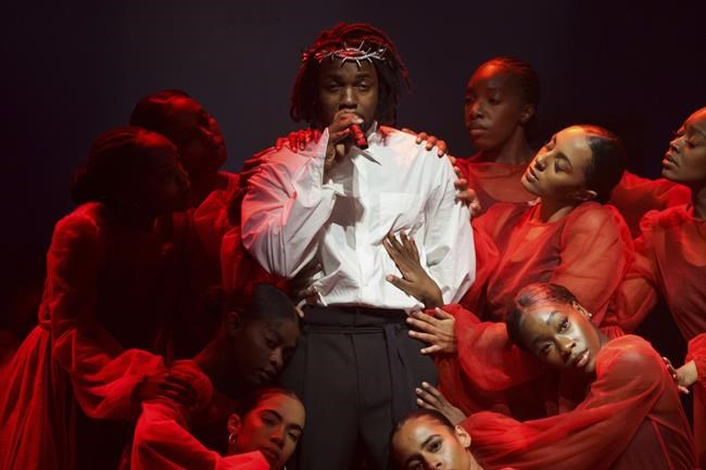 Kendrick Lamar performs at the Glastonbury Festival in Worthy Farm, Somerset, England, Sunday, June 26, 2022. (AP Photo/Scott Garfitt)