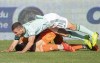 Atlanta United's Brooks Lennon (11) falls on top of CF Montreal's goalkeeper Sebastian Breza during second half MLS soccer action in Montreal, Saturday, April 30, 2022. Lennon, who had to be carried off after suffering an injury in warmup prior to Saturday's 2-1 loss in Toronto, will be out six to eight weeks due to a medial collateral ligament sprain in his left knee. THE CANADIAN PRESS/Graham Hughes
