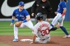 Boston Red Sox centre fielder Rob Refsnyder (30) is out at second base on an attempted steal with a tag from Toronto Blue Jays third baseman Matt Chapman (26) during first inning American League baseball action in Toronto on Tuesday June 28, 2022. THE CANADIAN PRESS/Jon Blacker
