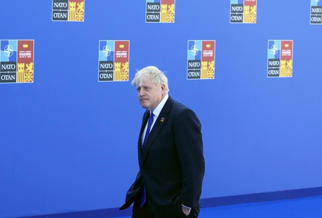 British Prime Minister Boris Johnson arrives for the NATO summit in Madrid, Spain on Wednesday, June 29, 2022. North Atlantic Treaty Organization heads of state will meet for a NATO summit in Madrid from Tuesday through Thursday. (AP Photo/Paul White)