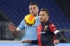 Genoa's Domenico Criscito, right, and Lazio's Sergej Milinkovic-Savic, left, vie for the ball during the Italian Series A soccer match between Lazio and Genoa, at Rome's Olympic stadium on December 17, 2021. THE CANADIAN PRESS/AP, Gregorio Borgia