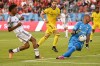 Toronto FC midfielder Kosi Thompson, left, is stopped by Columbus Crew goalkeeper Eloy Room during first half MLS soccer action in Toronto on Wednesday, June 29, 2022. THE CANADIAN PRESS/Jon Blacker