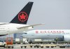 Air Canada planes sit on the tarmac at Pearson International Airport in Toronto on Wednesday, April 28, 2021. THE CANADIAN PRESS/Nathan Denette
