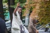 Belgium's Divock Origi salutes fans as he arrives to undergo his medical examinations ahead of moving to AC Milan on a free transfer from Liverpool, in Milan, Italy, Tuesday, June 28, 2022. (LaPresse via AP)