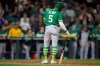 Oakland Athletics' Tony Kemp reacts after he was called out on strikes during the ninth inning of the team's baseball game against the Seattle Mariners, Thursday, June 30, 2022, in Seattle. The Mariners won 8-6. (AP Photo/John Froschauer)