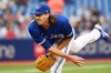 Toronto Blue Jays' starting pitcher Kevin Gausman throws to a Boston Red Sox batter in first inning American League baseball action in Toronto on Monday June 27, 2022. Gausman was helped off the field in the Toronto Blue Jays first game of a doubleheader against the Tampa Bay Rays. THE CANADIAN PRESS/Jon Blacker