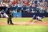 Toronto Blue Jays' starting pitcher Bo Bichette slides safely into home ahead of the throw to Tampa Bays Rays' catcher Rene Pinto in first inning American League baseball action in Toronto, Saturday, July 2, 2022. THE CANADIAN PRESS/Jon Blacker