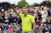 Poland's Adrian Meronk celebrates winning on the final green during day four of the Irish Open 2022 at Mount Juliet Estate, Thomastown, Co Kilkenny, Ireland, Sunday July 3, 2022. Meronk is the Irish Open winner and adds the best label of all. He already was the first Polish player to earn a European tour card and the first to play in a U.S. Open. Now he's the first Pole to win on the European tour. (Donall Farmer/PA via AP)