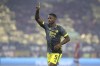 FILE - Feyenoord's Tyrell Malacia gestures during the Europa Conference League final soccer match between AS Roma and Feyenoord at National Arena in Tirana, Albania, on May 25, 2022. Manchester United has gone back to the Netherlands to buy its first player since Erik ten Hag arrived as coach. Tyrell Malacia signed from Feyenoord for a reported initial fee of $15.4 million. He will compete with England international Luke Shaw to play at left back. United says Malacia signed a four-year contract. (AP Photo/Franc Zhurda)