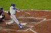 Texas Rangers' Josh Smith hits a sacrifice fly ball to score Nathaniel Lowe from third base against the Baltimore Orioles during the fifth inning of a baseball game, Tuesday, July 5, 2022, in Baltimore. (AP Photo/Julio Cortez)