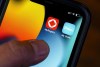 Rogers and Shaw applications are pictured on a cellphone in Ottawa on Monday, May 9, 2022. THE CANADIAN PRESS/Sean Kilpatrick