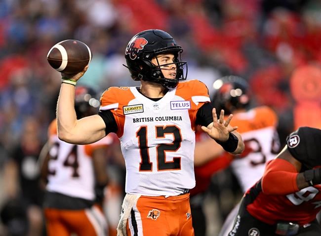 BC Lions quarterback Nathan Rourke (12) throws the ball during first half CFL football action against the Ottawa Redblacks in Ottawa on June 30, 2022. THE CANADIAN PRESS/Justin Tang