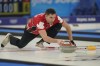 John Morris, of Canada, throws a rock during the mixed doubles curling match against the Czech Republic at the Beijing Winter Olympics, in Beijing, Monday, Feb. 7, 2022. Morris and Shannon Birchard have joined forces in mixed doubles curling. THE CANADIAN PRESS/AP-Brynn Anderson