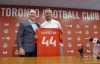 Toronto FC president Bill Manning, left, poses for a photo with newly signed Italian defender Domenico Criscito as he meets the media for the first time as a Toronto FC player, in Toronto, Wednesday, July 6, 2022. THE CANADIAN PRESS/Neil Davidson, *MANDATORY CREDIT*
