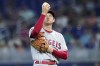Los Angeles Angels starting pitcher Shohei Ohtani prepares to throw during the first inning of the team's baseball game against the Miami Marlins, Wednesday, July 6, 2022, in Miami. (AP Photo/Lynne Sladky)