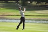Adam Svensson hits on the eighth hole during the first round of the Barbasol Championship golf tournament, Thursday, July 7, 2022, in Nicholasville, Ky. (AP Photo/John Amis)