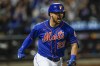 New York Mets' J.D. Davis celebrates after hitting a grand slam during the fifth inning of the team's baseball game against the Miami Marlins on Thursday, July 7, 2022, in New York. (AP Photo/Frank Franklin II)