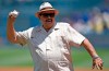 FILE - Los Angeles Dodgers scout Mike Brito throws out the first pitch prior to a baseball game between the Dodgers and the Colorado Rockies in Los Angeles, July 3, 2016. Brito, the top scout in Mexico for the Dodgers for nearly 45 years who discovered such talents as Fernando Valenzuela, current Dodgers pitcher Julio Urías and Yasiel Puig, died Thursday, July 7, 2022. He was 87. The team announced his death to the crowd before hosting the Chicago Cubs and held a moment of silence. (AP Photo/Kelvin Kuo, File)