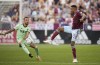 Colorado Rapids midfielder Mark-Anthony Kaye, right, passes the ball as Austin FC forward Maximiliano Urruti defends in the first half of an MLS soccer match Monday, July 4, 2022, in Commerce City, Colo. Toronto FC continues to remake its roster, acquiring Mark-Anthony Kaye from the Colorado Rapids.THE CANADIAN PRESS/AP-David Zalubowski