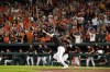Baltimore Orioles designated hitter Trey Mancini gestures while hitting a game-winning single to score Cedric Mullins during the ninth inning of a baseball game against the Los Angeles Angels, Friday, July 8, 2022, in Baltimore. The Orioles won 5-4. (AP Photo/Julio Cortez)