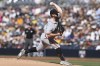 San Francisco Giants starting pitcher Carlos Rodon delivers to San Diego Padres' Ha-Seong Kim in the first inning of a baseball game Saturday, July 9, 2022, in San Diego. (AP Photo/Derrick Tuskan)