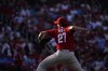 Philadelphia Phillies starting pitcher Aaron Nola throws during the first inning of a baseball game against the St. Louis Cardinals Monday, July 11, 2022, in St. Louis. (AP Photo/Jeff Roberson)
