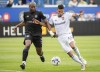 CF Montreal's Kamal Miller, left, challenges Real Salt Lake's Maikel Chang during second half MLS soccer action in Montreal, Sunday, May 22, 2022.&nbsp;CF Montreal defender Miller is headed to the MLS all-star game.&nbsp;THE CANADIAN PRESS/Graham Hughes
