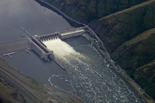 FILE - The Lower Granite Dam on the Snake River is seen from the air near Colfax, Wash., on May 15, 2019. The Biden administration has released two reports arguing that removing dams on the lower Snake River may be needed to restore salmon runs to historic levels in the Pacific Northwest. (AP Photo/Ted S. Warren, File)