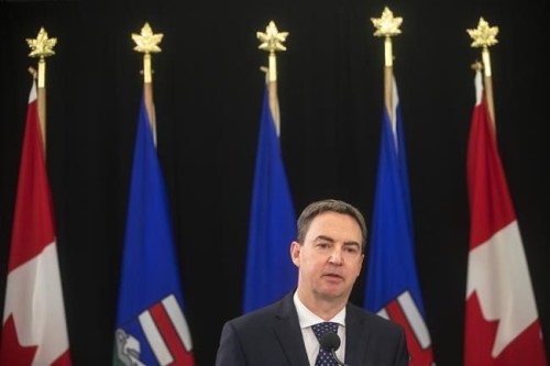 Jason Copping gives an update in Edmonton, Tuesday, Sept. 21, 2021. Starting next week, the province says Albertans will need a referral from a medical professional to get a PCR test and some testing locations are to change. The Alberta health minister said in a statement the changes will allow the province to direct its testing capacity towards those who are most at risk.THE CANADIAN PRESS/Jason Franson
