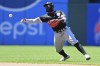 Chicago White Sox second baseman Josh Harrison throws to first to put out Cleveland Guardians' Austin Hedges in the seventh inning in the first baseball game of a doubleheader, Tuesday, July 12, 2022, in Cleveland. The Guardians won 4-1. (AP Photo/David Dermer)