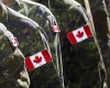 Members of the Canadian Armed Forces march in Calgary on July 8, 2016. THE CANADIAN PRESS/Jeff McIntosh